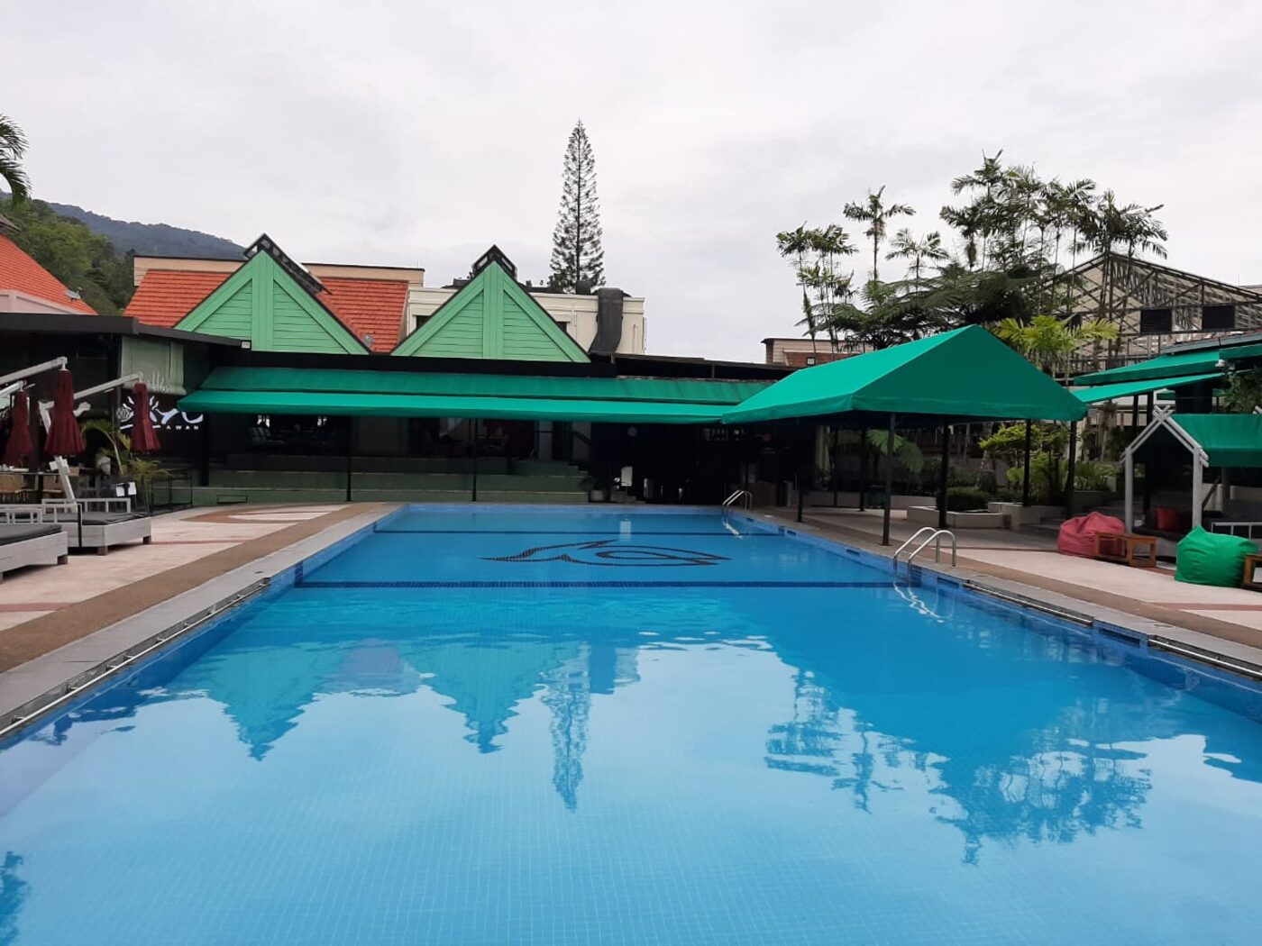 Fixed canopy in Malaysia — permanent engineered canopy over an outdoor deck
